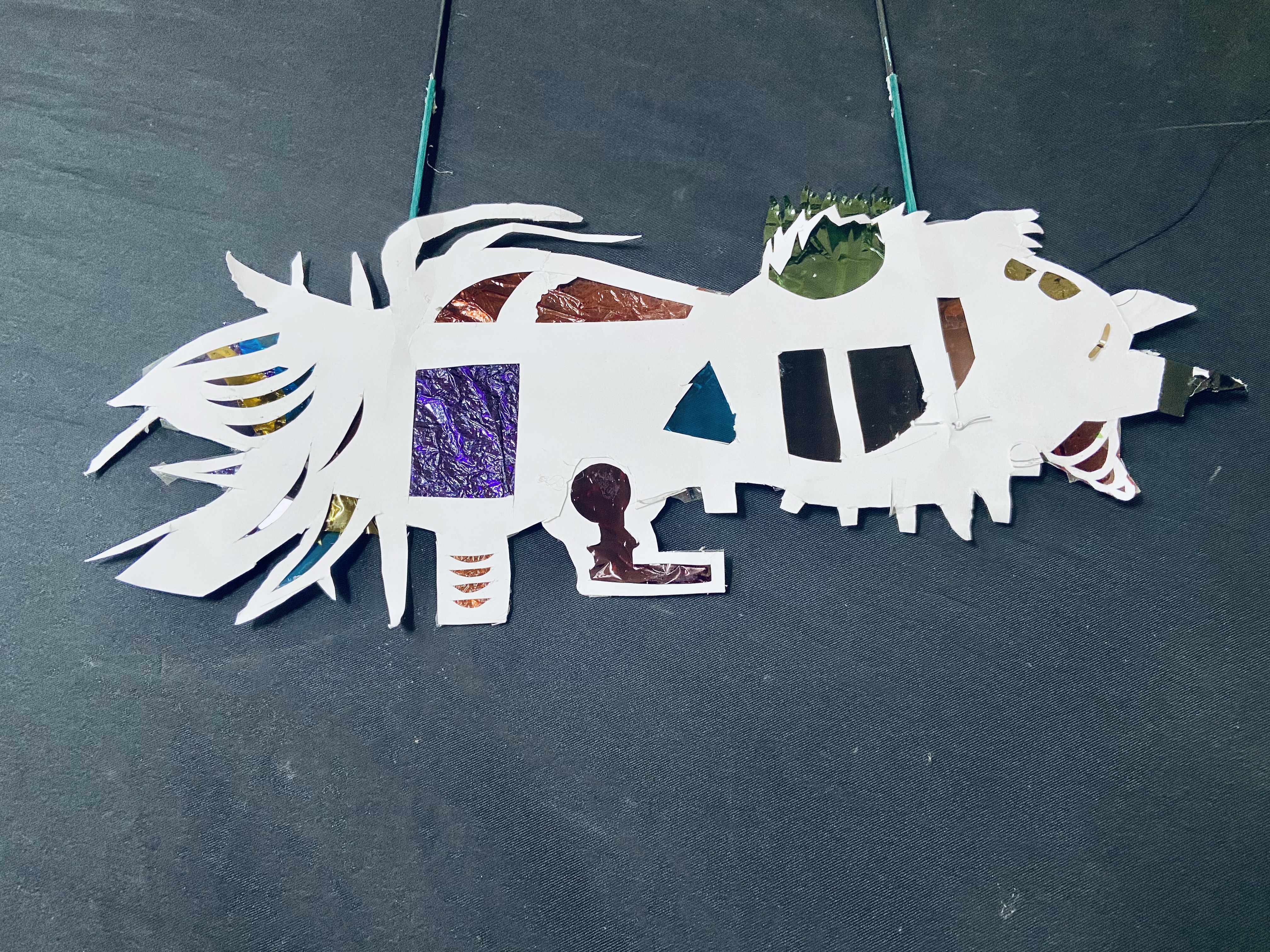 Children creating shadow puppets in workshop